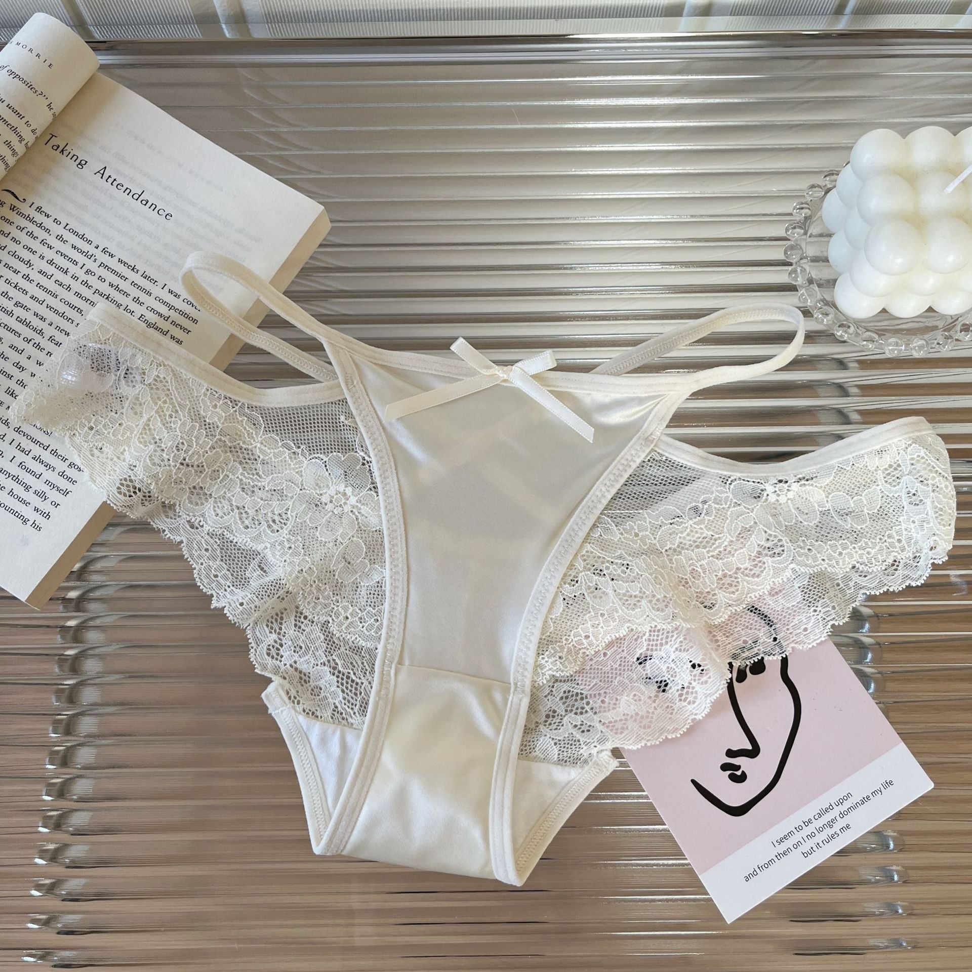 Braga con encaje y cintas laterales elásticas